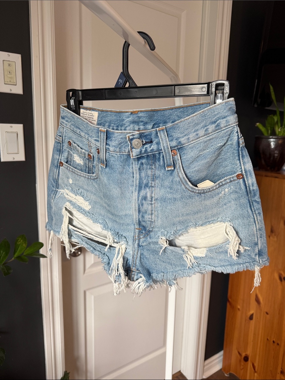 Levi’s 501 Distressed Light Blue Denim Shorts